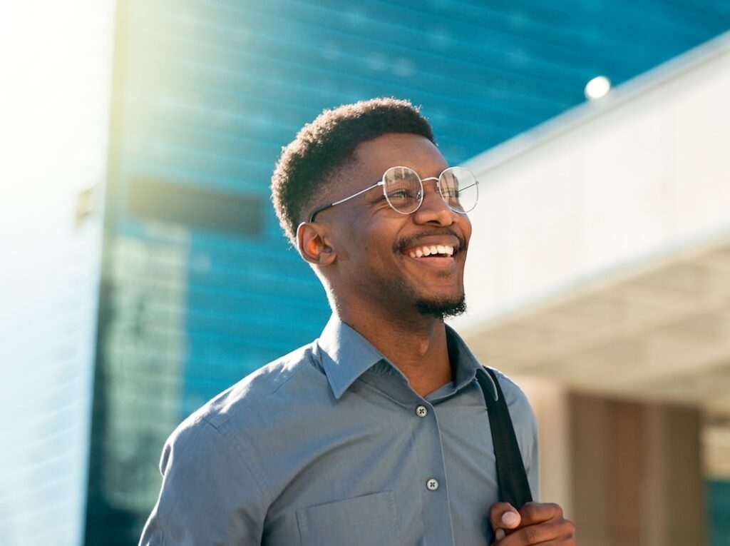 Business, happy and walking man on city journey, commute