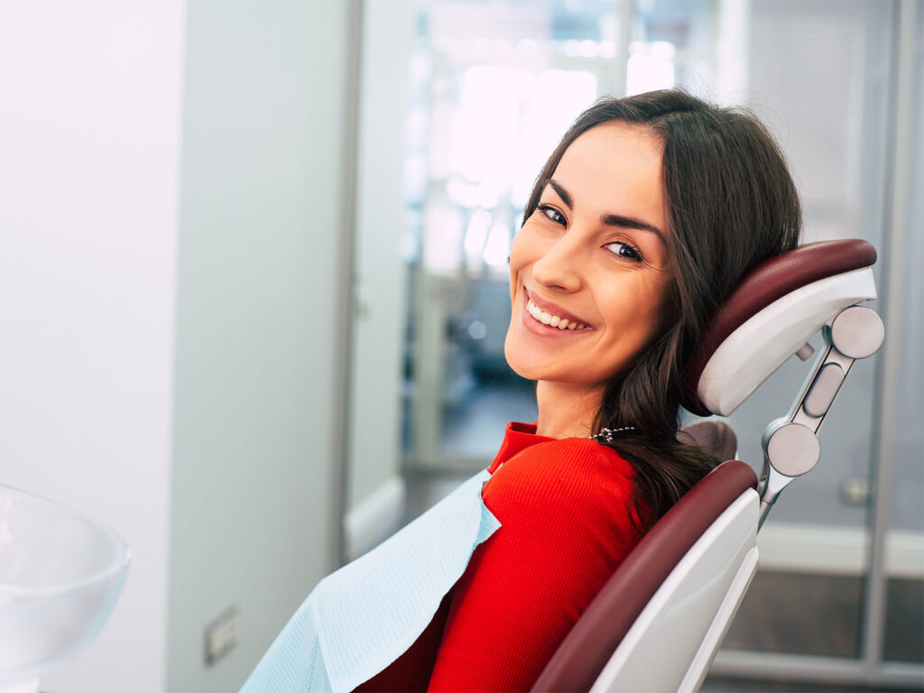 woman-smiling-in-chair